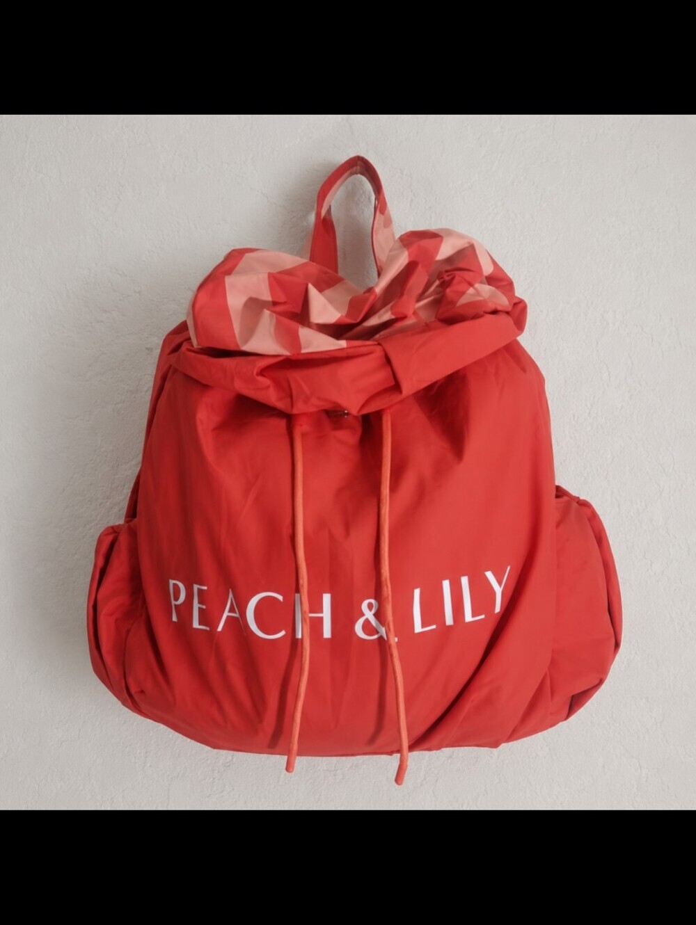 Peach & Lily Coral Logo Drawstring Backpack